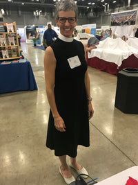 rev lisa cressman wearing aline clergy dress with round collar