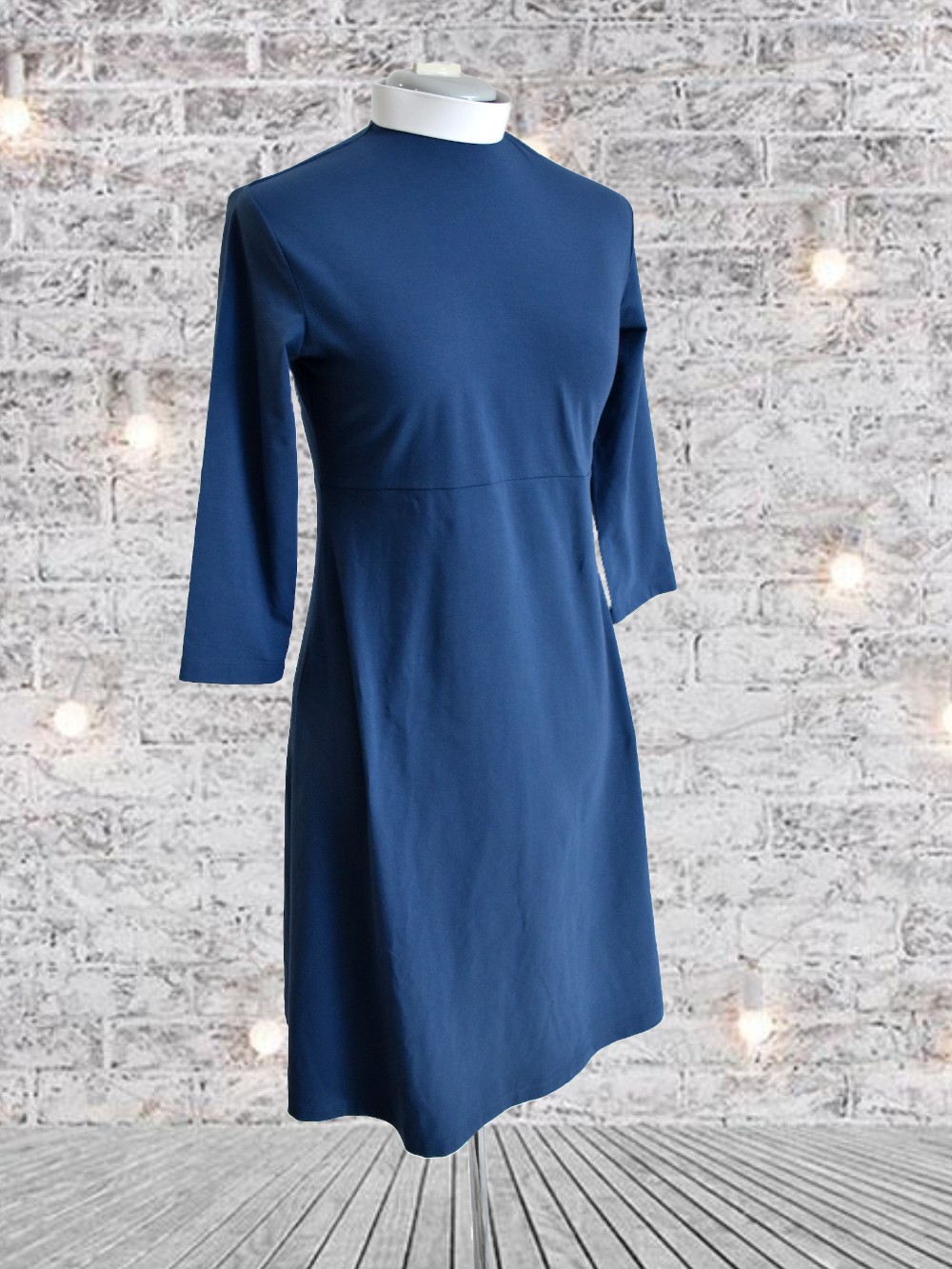 aline clergy dress in blue grey with round clerical collar