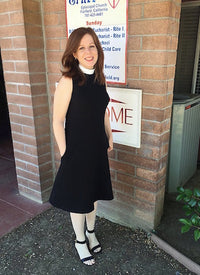 Rev Megan Anderson Gartin wearing sleeveless a-line clergy dress with pockets